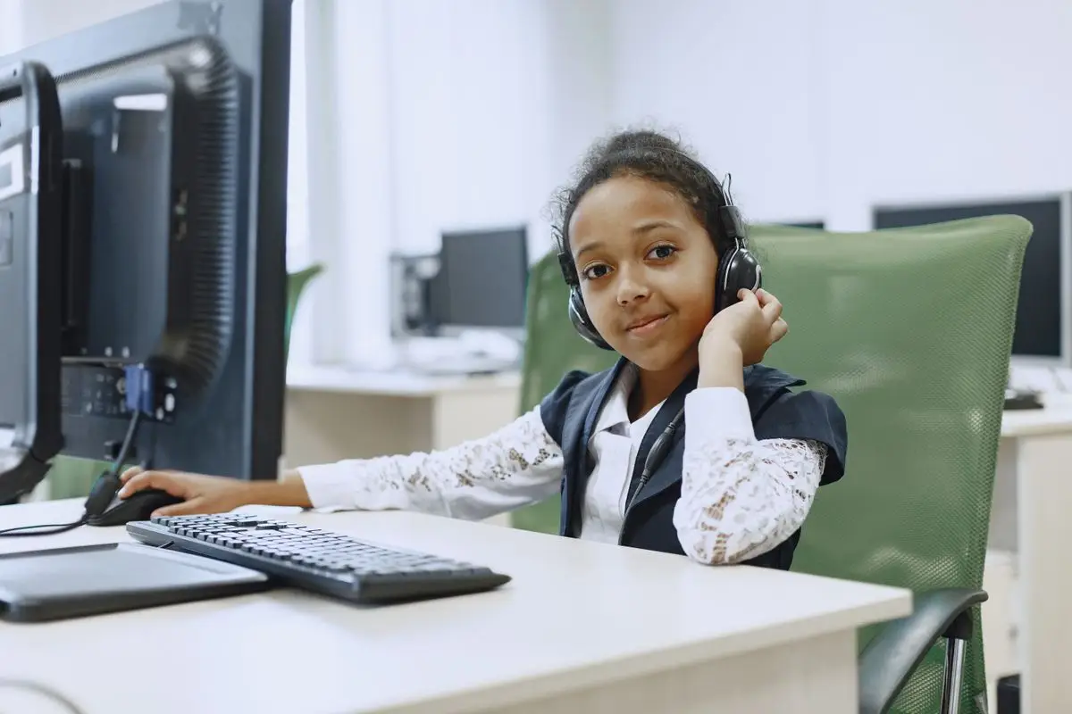 Teenager attending a live online Quran class with a tutor